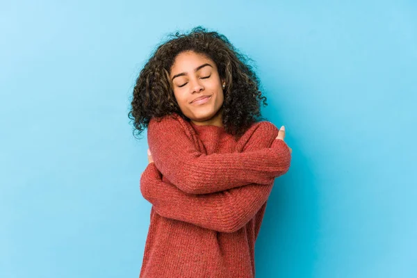 - depositphotos 335058502 stock photo young african american curly hair - ການກອດ ຊ່ວຍບໍາບັດອາລົມຄວາມຮູ້ສຶກໃຫ້ດີຂຶ້ນ ແລະ ຫລຸດຄວາມຄຽດໄດ້ອີກດ້ວຍ